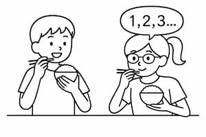 食事をよく噛んで食べる少年少女の画像