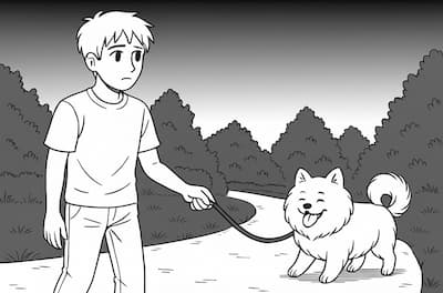 早朝に犬と散歩する少年の画像